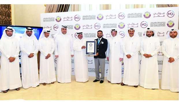 HE the Minister of Transport and Communications Jassim Seif Ahmed al-Sulaiti receiving the certificate from Guinness World Records representative Swapnil Dangarikar in the presence of other officials. PICTURE: Noushad Thekkayil