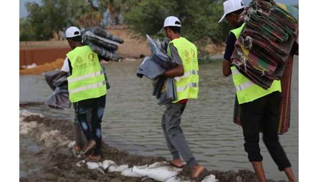 Volunteers carry out relief work in Sudan.