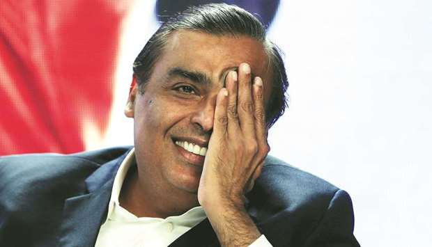 Mukesh Ambani, chairman and managing director of Reliance Industries, gestures as he answers a question during a media interaction in New Delhi (file).