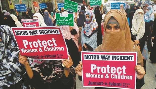 Supporters of the Jamaat-e-Islami (JI) at a protest in Karachi against an alleged gang rape of a woman.