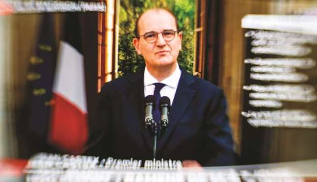 This image of a television screen shows French Prime Minister Castex as he speaks on the coronavirus situation during a press conference at the Hotel Matignon in Paris.