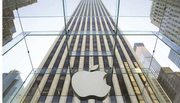 The Apple logo at its 5th Avenue location in New York. Apple has asked suppliers to build at least 75mn 5G iPhones for later this year, roughly in line with last yearu2019s launch, in a sign that demand for the companyu2019s most important product is holding up in the midst of the global pandemic and recession.