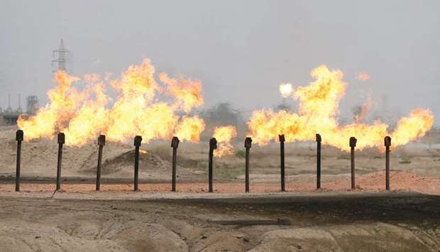 Flames seen at a station in Al-Zubair oilfield, near Basra (file). Iraqu2019s economy and oil sector were battered by years of wars, sanctions and a stubborn insurgency triggered by the US invasion.