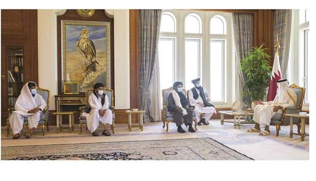 His Highness the Amir Sheikh Tamim bin Hamad al-Thani meeting with the head of the Afghan Taliban's 