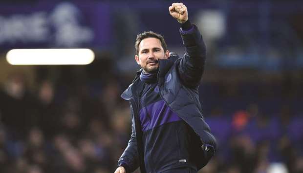 In this file photo taken on March 3, 2020, Chelseau2019s head coach Frank Lampard applauds the fans after the English FA Cup fifth round match against Liverpool at Stamford Bridge in London. (AFP)