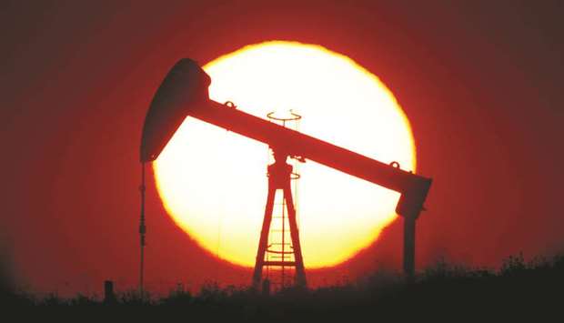 The sun sets behind an oil pump outside Saint-Fiacre, near Paris (file). The IEA, which advises major economies, trimmed forecasts for fuel consumption for the rest of the year and predicted that oil inventories u2013 which rebounded to record levels in July u2013 wonu2019t subside as sharply as anticipated.