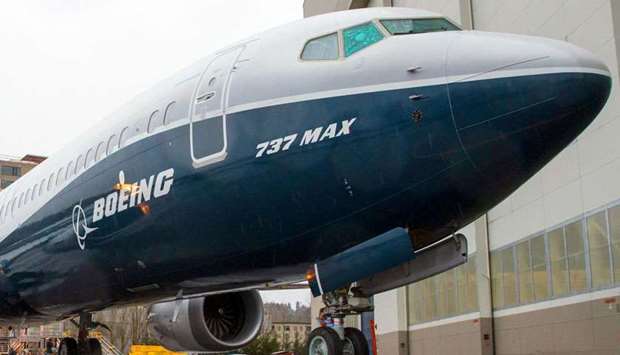 The first Boeing 737 MAX 9 airliner is pictured at the company's factory in Renton, Washington. A 245-page report issued o Wednesday provides the most scathing account so far of the miscalculations that led to 346 deaths, the grounding of Boeingu2019s best-selling jet and billions of dollars in losses for the manufacturing giant.