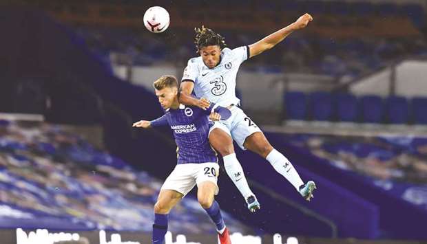 Chelseau2019s Reece James (right) and Brighton and Hove Albionu2019s Solly March vying for the ball during their Premier League match in Brighton, Britain. (Reuters)