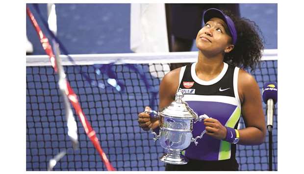 Naomi Osaka of Japan celebrates with the championship trophy after winning the US Open at USTA Billie Jean King National Tennis Center. (USA TODAY Sports/File Photo)