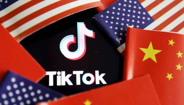 China and US flags are seen near a TikTok logo in this illustration picture taken July 16, 2020