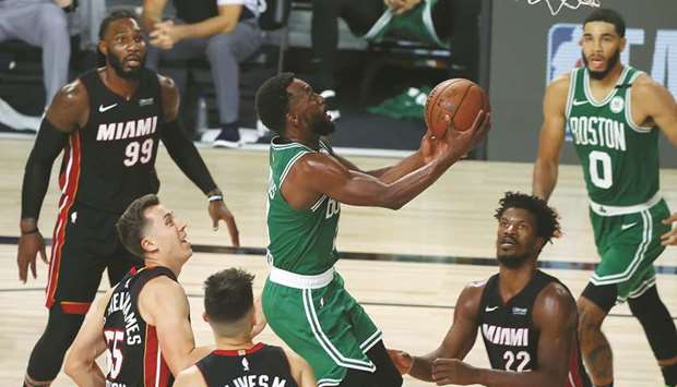 Kemba Walker of the Boston Celtics with a lay-up during the fourth quarter against the Miami Heat in Game Three of the Eastern Conference Finals during the 2020 NBA Playoffs at AdventHealth Arena at the ESPN Wide World Of Sports Complex in Lake Buena Vista, Florida, on Saturday.