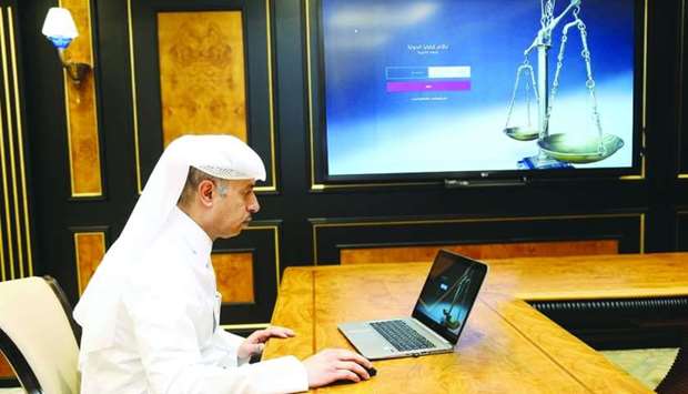 HE the Minister of Justice and Acting Minister of State for Cabinet Affairs Dr Issa bin Saad al Jafali al-Nuaimi inaugurates the electronic system for the State Cases Department.