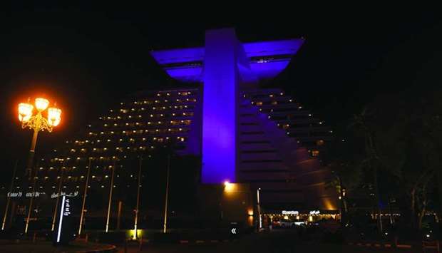 Several landmarks, including Sheraton Grand Doha Resort & Convention Hotel (in picture) and roads in the country were lit up in purple. PICTURES: Shemeer Rasheed