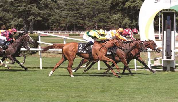 Jockey Pierre-Charles Boudot leads King Shalaa to victory in the Prix Christian Rollet, a Class 2 race for two-year-olds at Lyon-Parilly, France, yesterday. (Henri Durand)