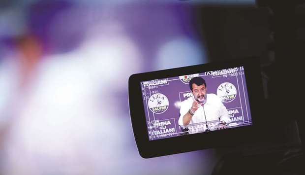 Salvini addresses the media in Milan on the results of regional elections.