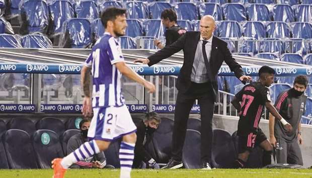Real Madrid coach Zinedine Zidane (right) during the La liga match against Real Sociedad in San Sebastian, Spain. (Reuters)