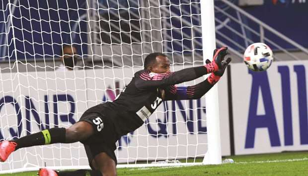 Shabab Al Ahli goalkeeper Majed Nasser in action during the AFC Champions League match against Pakhtakor on Sunday. (AFC)