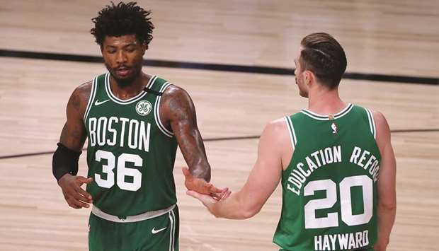 Boston Celticsu2019 Marcus Smart (left) and Gordon Hayward react during the fourth quarter of Game Three of the Eastern Conference Finals of the 2020 NBA Playoffs in Lake Buena Vista, Florida. (Getty Images/AFP)