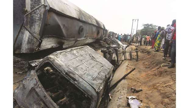 A general view of the wreckage of a truck that caught fire in Lokoja, Nigeria, yesterday.