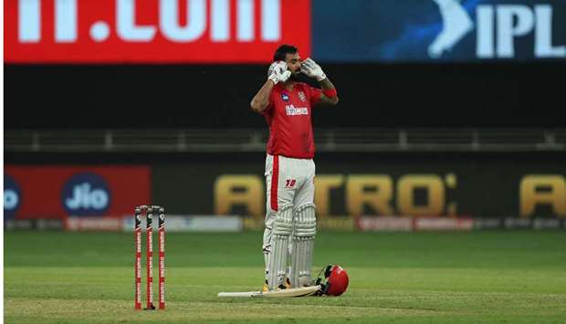KL Rahul, captain of Kings XI Punjab, celebrates his century against Royal Challengers Bangalore in Dubai yesterday. PICTURE: Sportzpics for BCCI