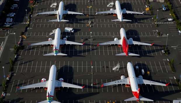 Boeing 737 Max aircraft are parked in a parking lot at Boeing Field in this aerial photo taken over Seattle, Washington, US on June 11. Reuters