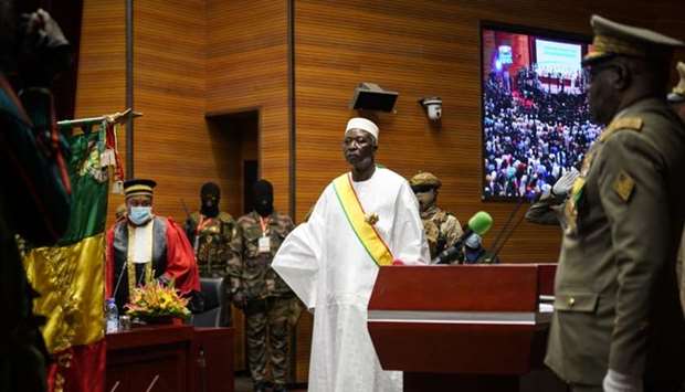 Transition Mali President Bah Ndaw (C) is seen during his inauguration ceremony at the CICB (Centre International de Conferences de Bamako) in Bamako