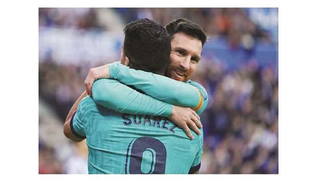 Barcelonau2019s Luis Suarez celebrates scoring their second goal with Lionel Messi during their La Liga match against Real Sociedad in San Sebastian, Spain, on December 14, 2019. (Reuters)