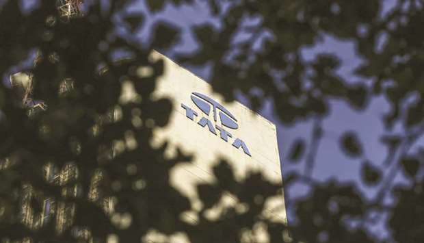 Signage for Tata Communications Ltd is displayed atop of the companyu2019s headquarters in Mumbai (file).