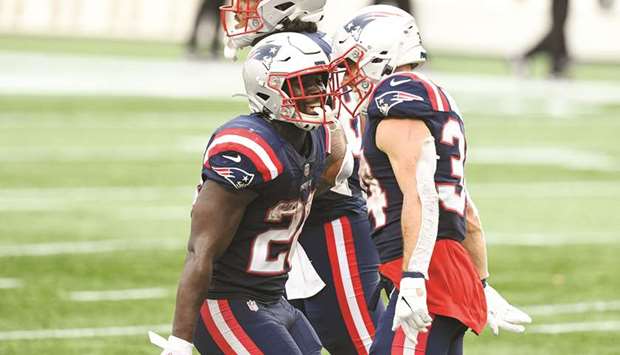 New England Patriots running back Rex Burkhead (right) celebrates with running back Sony Michel after scoring a touch down during the second half of their NFL game against Las Vegas Raiders at Gillette Stadium. (USA TODAY Sports)