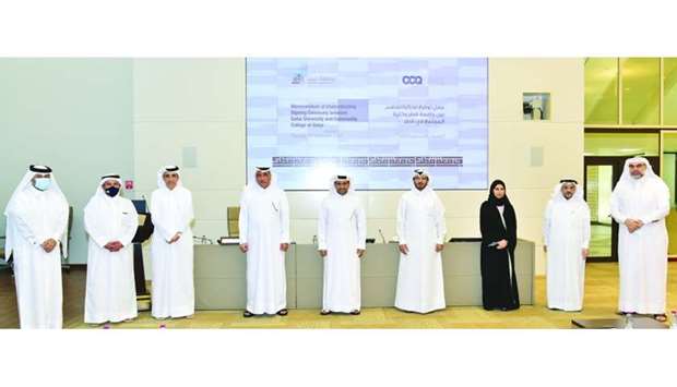 QU and CCQ officials at the MoU signing ceremony