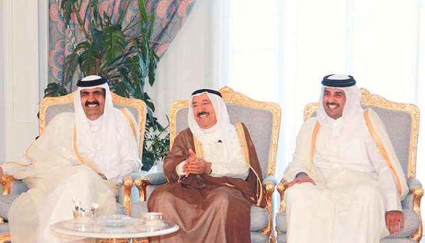 His Highness the Father Amir Sheikh Hamad bin Khalifa al-Thani and His Highness the Amir Sheikh Tamim bin Hamad al-Thani with Kuwaitu2019s Emir, Sheikh Sabah al-Ahmed al-Jaber al-Sabah, at the Amiri Diwan in Doha in June 2013.