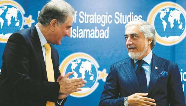 Chairman of the High Council for National Reconciliation of Afghanistan, Abdullah Abdullah, and Foreign Minister Shah Mahmood Qureshi are seen at an event at Islamabadu2019s Institute of Strategic Studies. The Afghan official overseeing Kabulu2019s efforts to forge a deal with the Taliban arrived on Monday for a three-day visit to Pakistan, the influential neighbour vital to the peace process.