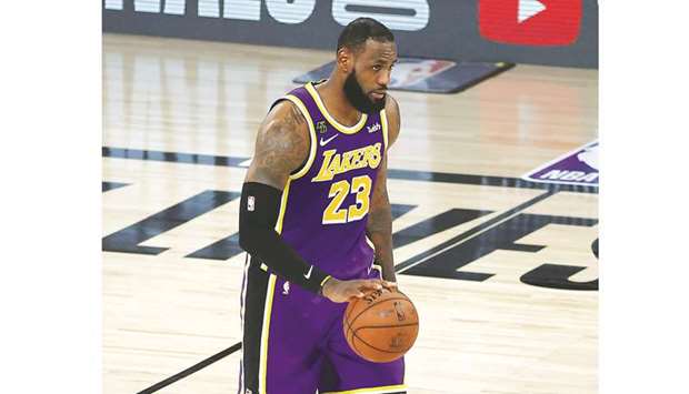 LeBron James of the Los Angeles Lakers dribbles the ball during the fourth quarter against the Denver Nuggets in Game Five of the Western Conference Finals during the 2020 NBA Playoffs at the ESPN Wide World Of Sports Complex in Lake Buena Vista, Florida on Saturday. (Getty Images/AFP)