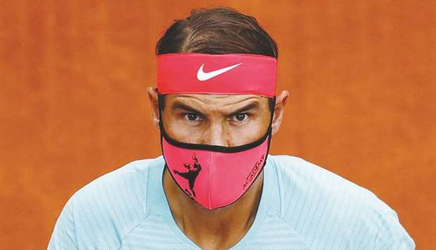 Spainu2019s Rafael Nadal wears a protective face mask before his first round French Open match at Roland Garros in Paris, France, on Monday. (Reuters)