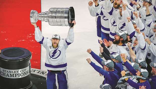 Tampa Bay Lightning center Steven Stamkos hoists the Stanley Cup after the Lightning defeated the Dallas Stars in game six of the 2020 Stanley Cup Final at Rogers Place in Edmonton. (USA TODAY Sports)