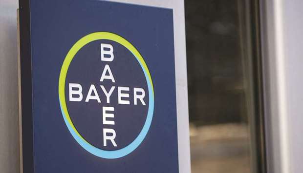 The Bayer logo at the companyu2019s pharmaceutical division factory in Berlin. u201cIt is not uncommon to receive a few number of objections to a class agreement, especially when there is a large class as there is here with over 2,500 municipal entities,u201d Bayer said in a statement.