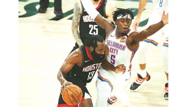 Houston Rockets guard James Harden (13) drives against Oklahoma City Thunder guard Luguentz Dort (5) during the second half of game seven of the first round of the 2020 NBA Playoffs at ESPN Wide World of Sports Complex on Wednesday. PICTURE: Kim Klement-USA TODAY Sports
