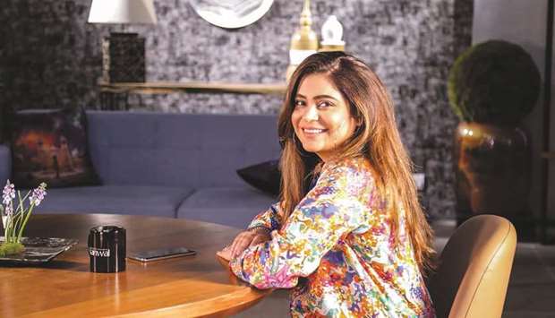 In this undated handout picture taken in 2019 and received courtesy of Kanwal Ahmed, the former make-up artist who is the founder of social online group u2018Soul Sisters Pakistanu2019, poses for a photograph on the set of her online talkshow in Karachi.