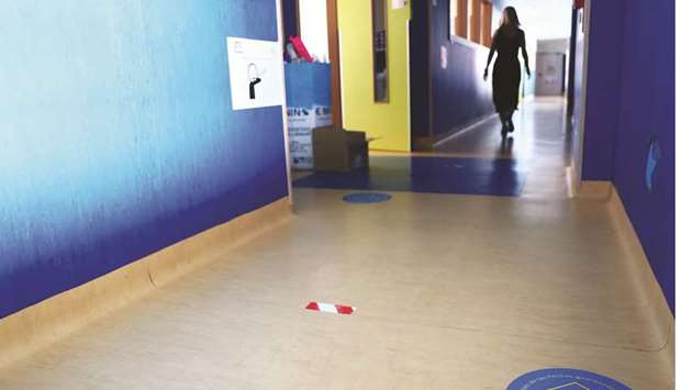 Direction and social distancing markers are seen on the floor in preparation of studentsu2019 return to school at the San Juan Bautista school in Arganda del Rey, near Madrid.