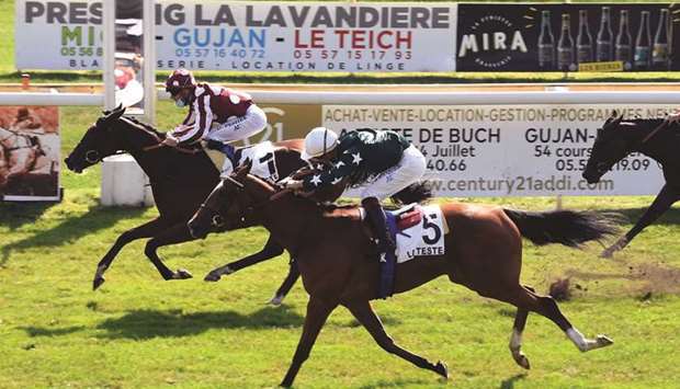 Olivier Peslier (left) rides Samrah to victory in the Prix Decathlon La Teste at La Teste-de-Buch in France yesterday. (Robert Polin)