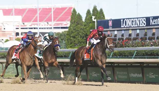 Florent Geroux (right) rides Shedaresthedevil to victory in the Kentucky Oaks (Group 1) at Churchill Downs in the United States on Friday. (Racingfotos)