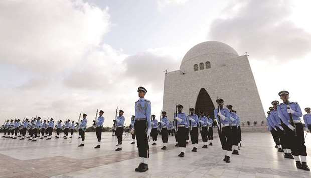 Members of the Pakistan Air Force (PAF) stand in formation at the mausoleum of Mohamed Ali Jinnah in Karachi, during Defence Day ceremonies yesterday.