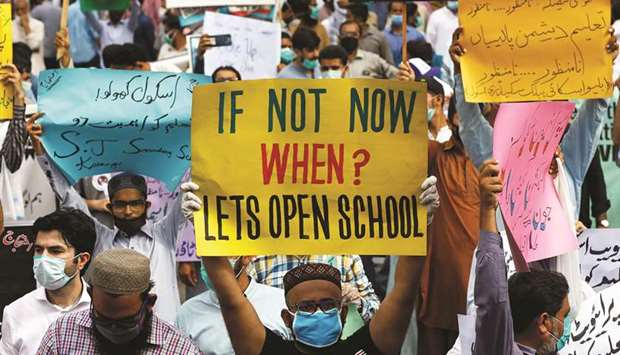This picture taken in June shows teachers of private schools during a protest in Karachi to demand the reopening of schools.