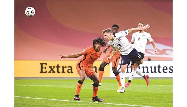 Italyu2019s Nicolo Barella (right) scores against the Netherlands during the UEFA Nations League match in Amsterdam on Monday night. (Reuters)