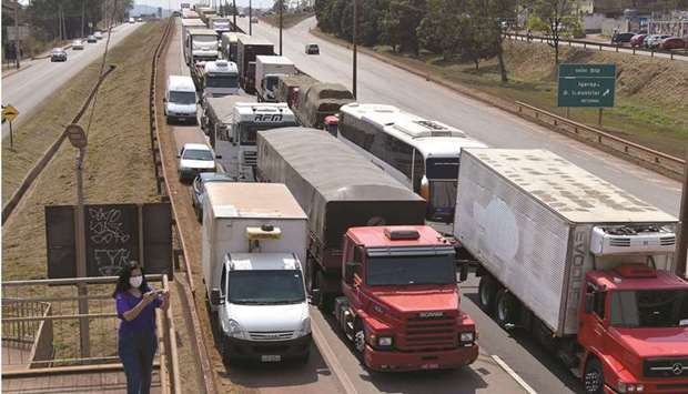 Truckers take part in a protest on the BR-381 highway yesterday in support of President Jair Bolsonaro, in Igarape, Minas Gerais, Brazil.