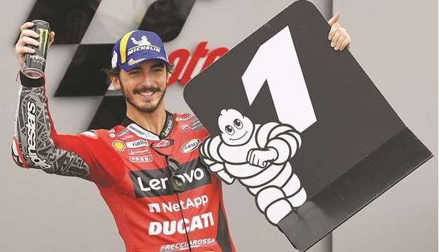 Ducati Italian rider Francesco Bagnaia celebrates getting pole position for the Moto Grand Prix of Aragon at the Motorland Circuit in Alcaniz yesterday. (AFP)