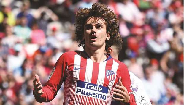 In this file photograph taken on April 27, 2019, Atletico Madridu2019s French forward Antoine Griezmann reacts after missing a goal opportunity during the Spanish League match against Real Valladolid at the Wanda Metropolitan Stadium in Madrid. (AFP)