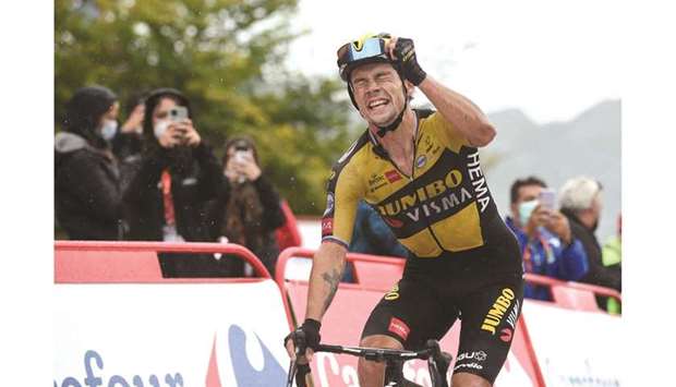 Team Jumbou2019s Slovenian rider Primoz Roglic celebrates as he wins the 17th stage of the La Vuelta in Lagos de Covadonga, Spain yesterday. (AFP)