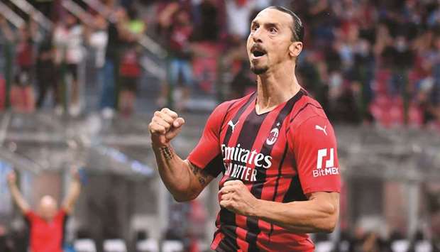 AC Milanu2019s Zlatan Ibrahimovic celebrates his goal during the Serie A match against Lazio at San Siro in Milan, Italy, yesterday. (Reuters)