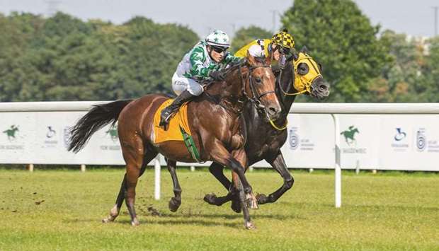 Kamil Grzybowski (left) rides Al Faisal to Amuraths Stakes win at Sluzewiec Racecourse in Poland on Saturday. (Sluzewiec Racecourse)